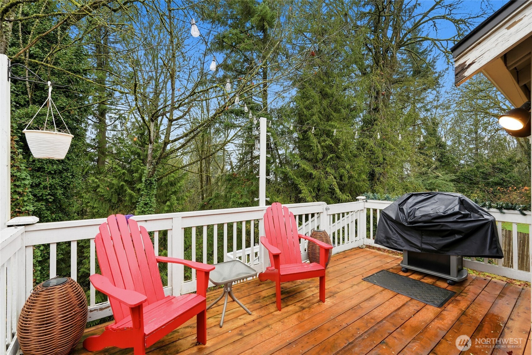 15003 104th Avenue Northeast Bothell, WA 98011 - Photo 14 of 40 a view of balcony with wooden floor and outdoor seating