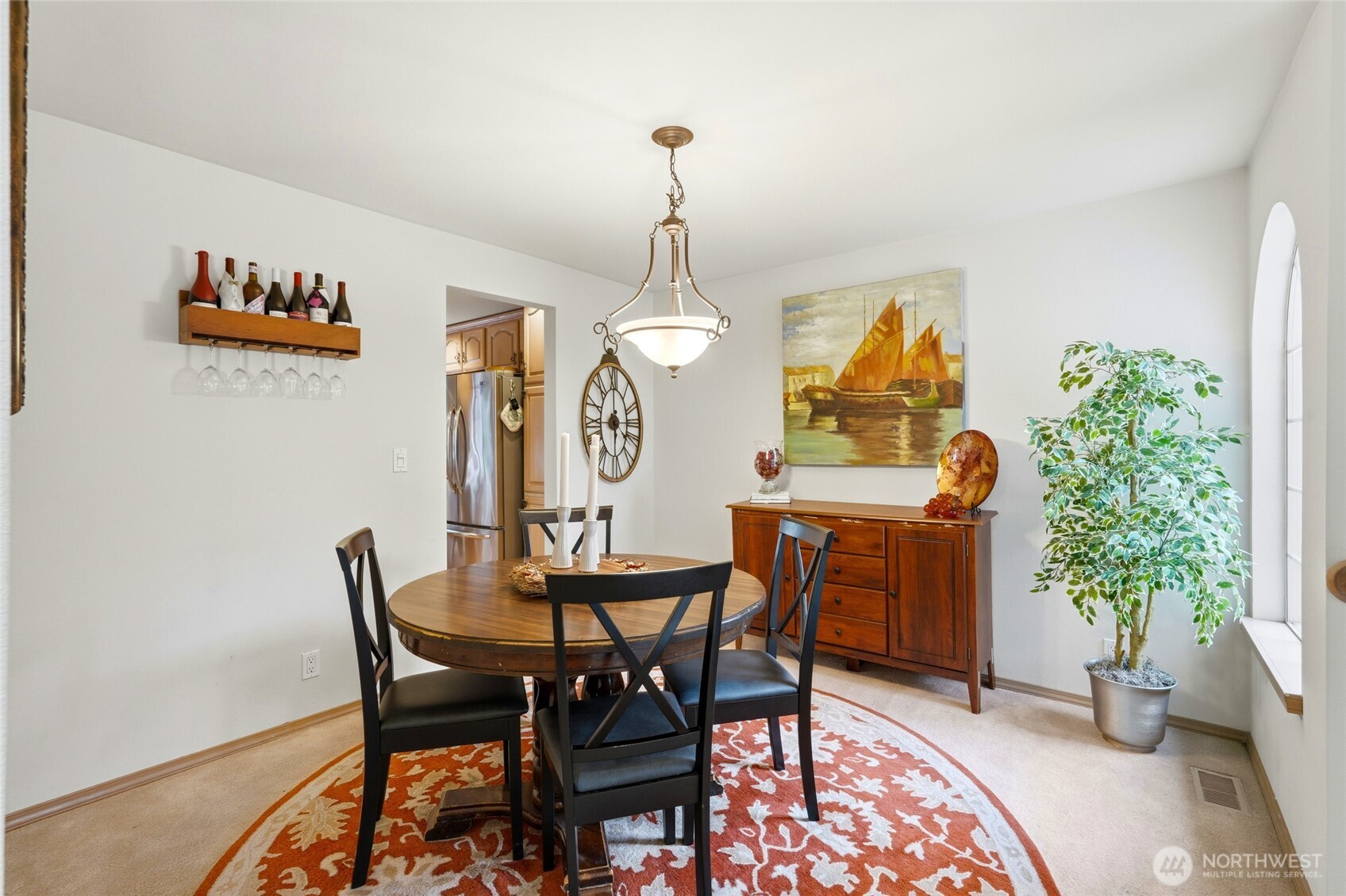 15003 104th Avenue Northeast Bothell, WA 98011 - Photo 19 of 40 a dining room with furniture and window