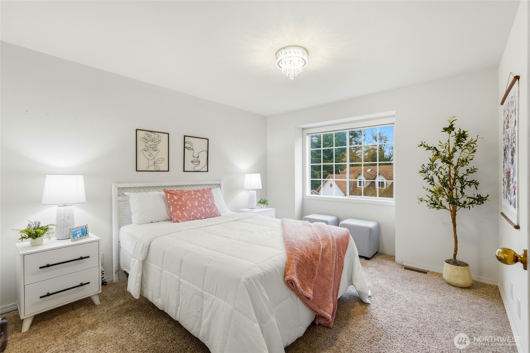 15003 104th Avenue Northeast Bothell, WA 98011 - Photo 26 of 40 a bedroom with a bed and a potted plant