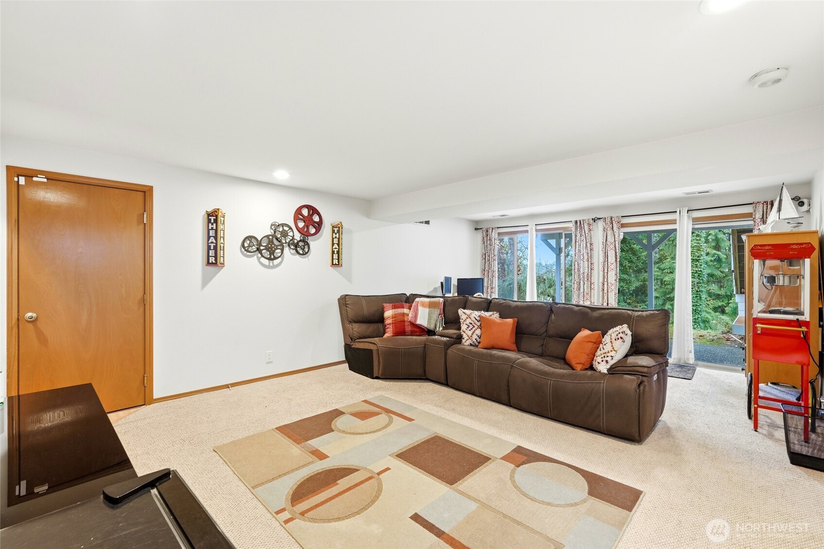 15003 104th Avenue Northeast Bothell, WA 98011 - Photo 29 of 40 a living room with furniture and a window