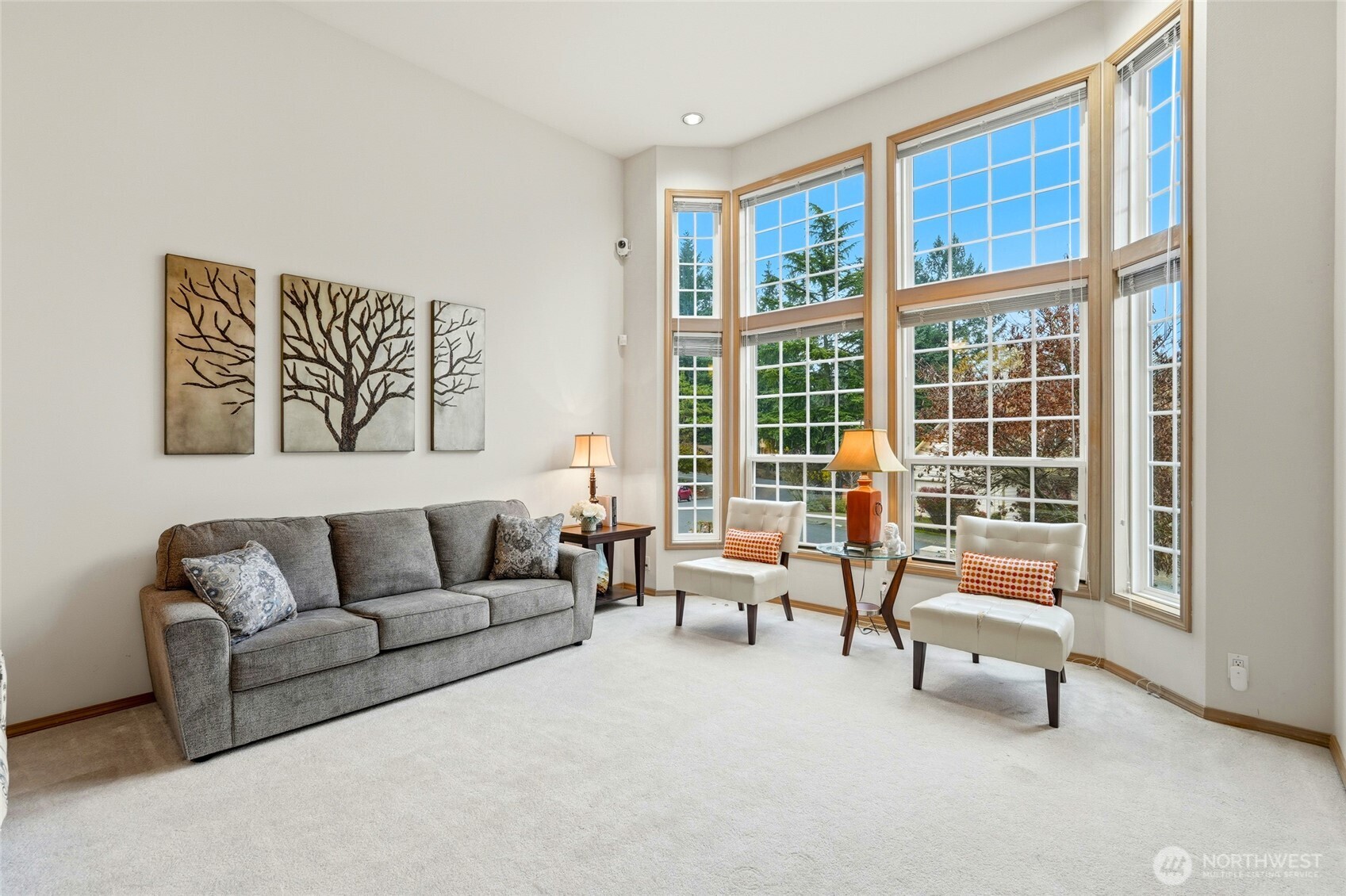 15003 104th Avenue Northeast Bothell, WA 98011 - Photo 5 of 40 a living room with furniture and a window