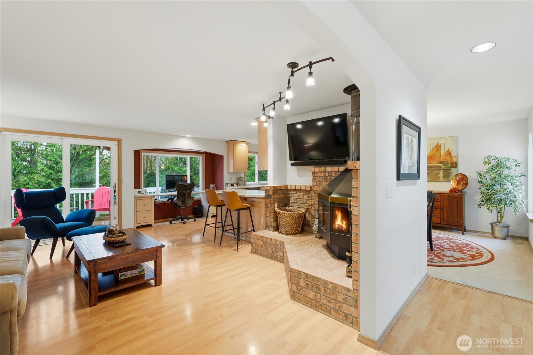 15003 104th Avenue Northeast Bothell, WA 98011 - Photo 10 of 40 a living room with furniture and a flat screen tv