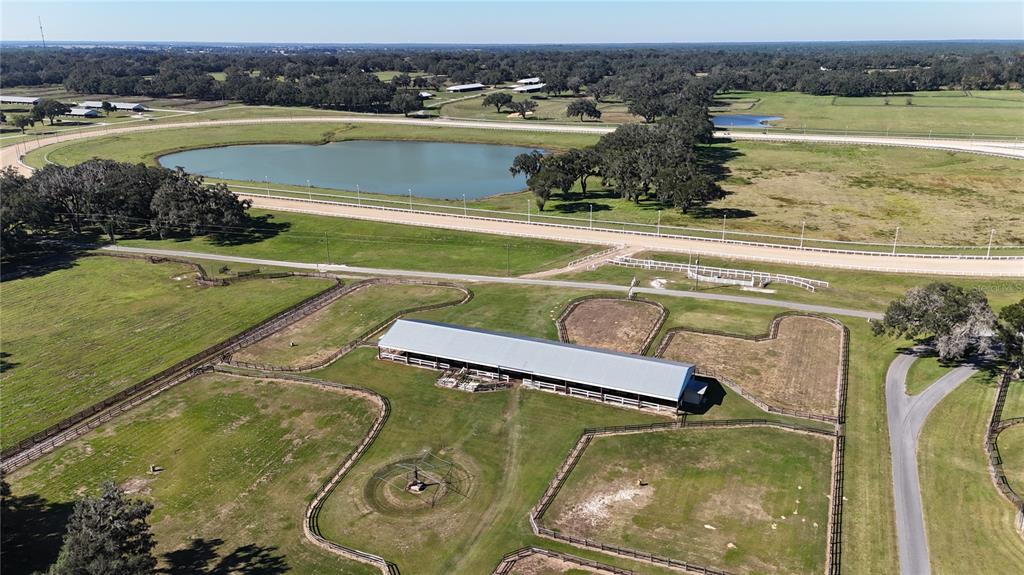 2711 Southwest 125th Avenue Ocala, FL 34481 - Photo 14 of 49 a view of a swimming pool with a lake view