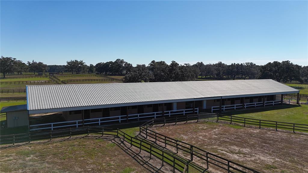 2711 Southwest 125th Avenue Ocala, FL 34481 - Photo 18 of 49 a view of a backyard with sitting area