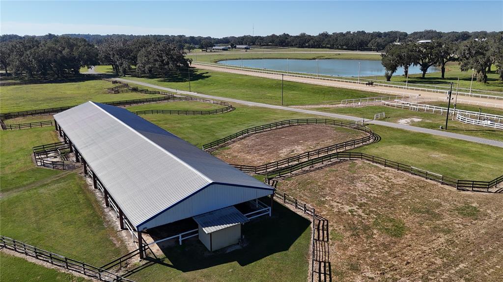 2711 Southwest 125th Avenue Ocala, FL 34481 - Photo 20 of 49 a view of a backyard with a lake view
