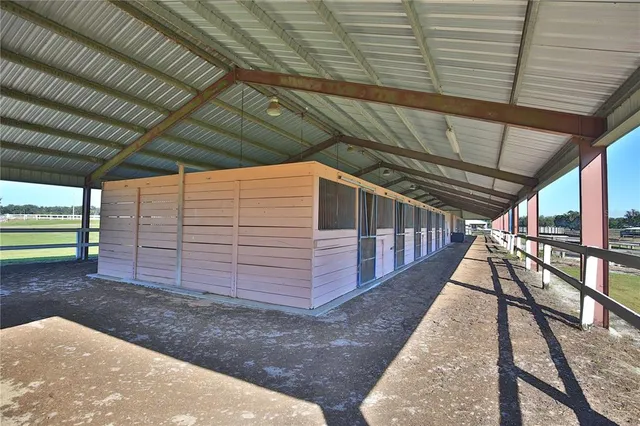 a view of a lake with houses in the background
