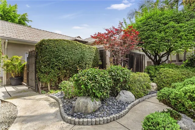 a house with river in front of it