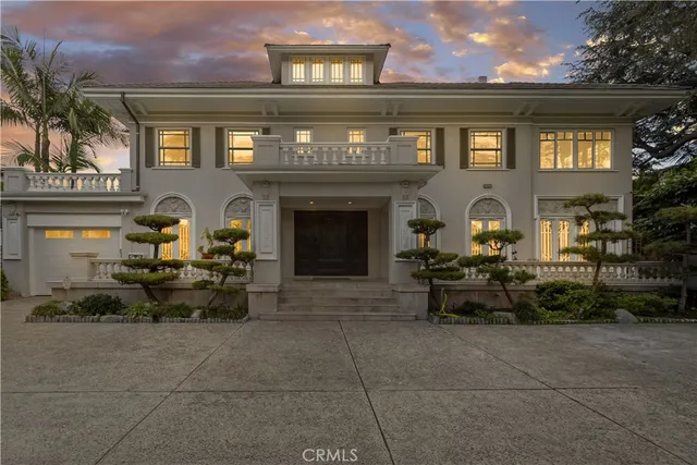 a house with river in front of it