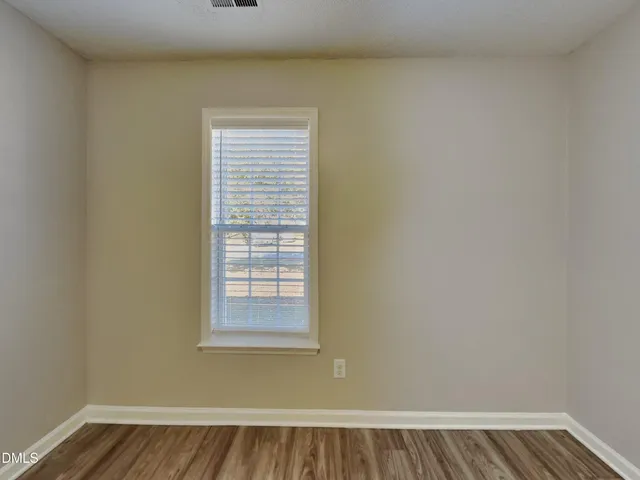 a bathroom with a sink mirror toilet and bathtub