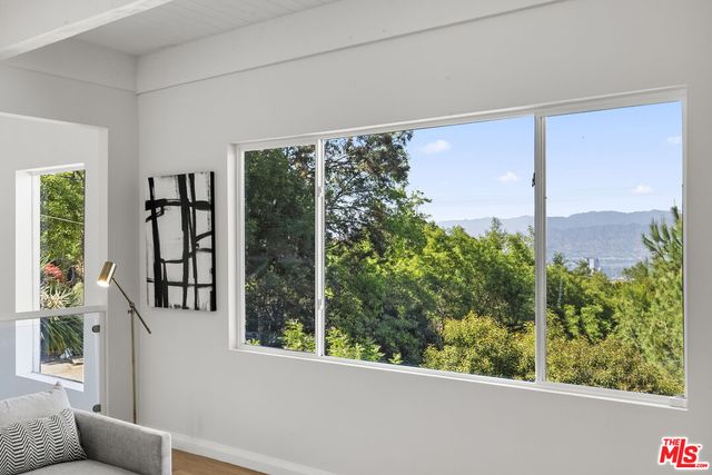 a view of a balcony filled with furniture