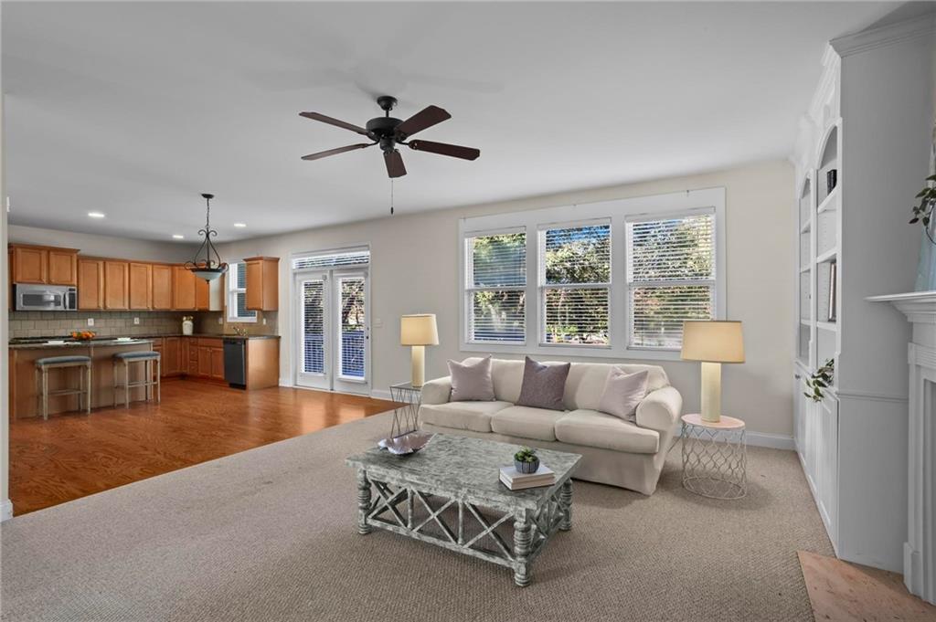 4250 Granby Circle Cumming, GA 30041 - Photo 11 of 37 a living room with furniture and a large window