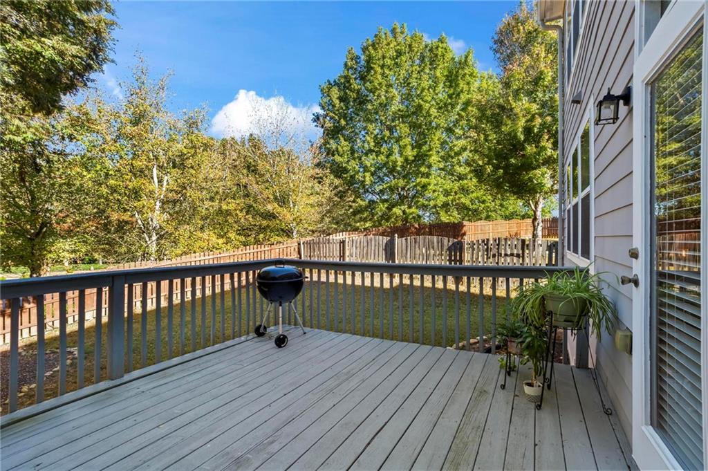 4250 Granby Circle Cumming, GA 30041 - Photo 18 of 37 a view of balcony with wooden floor
