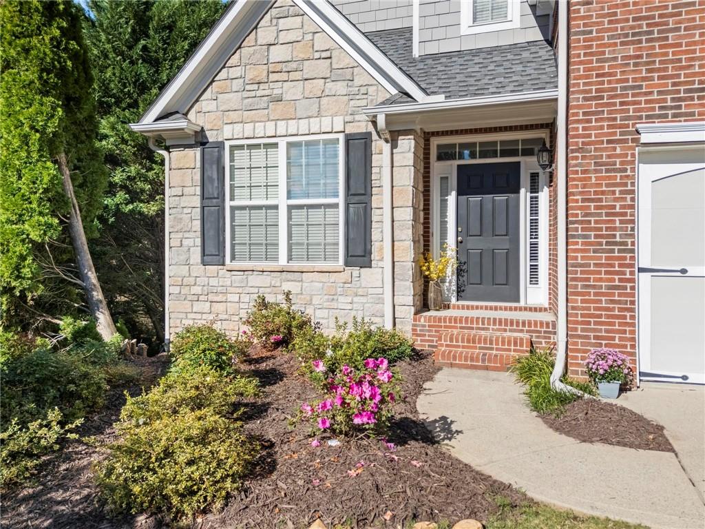 4250 Granby Circle Cumming, GA 30041 - Photo 2 of 37 a view of a house with a yard