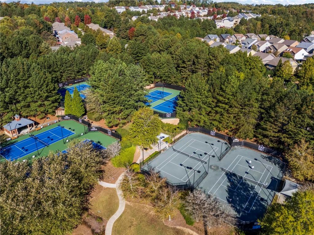 4250 Granby Circle Cumming, GA 30041 - Photo 36 of 37 an aerial view of a house with a yard and lake view