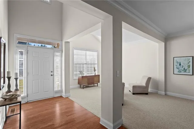 a view of room with furniture and windows