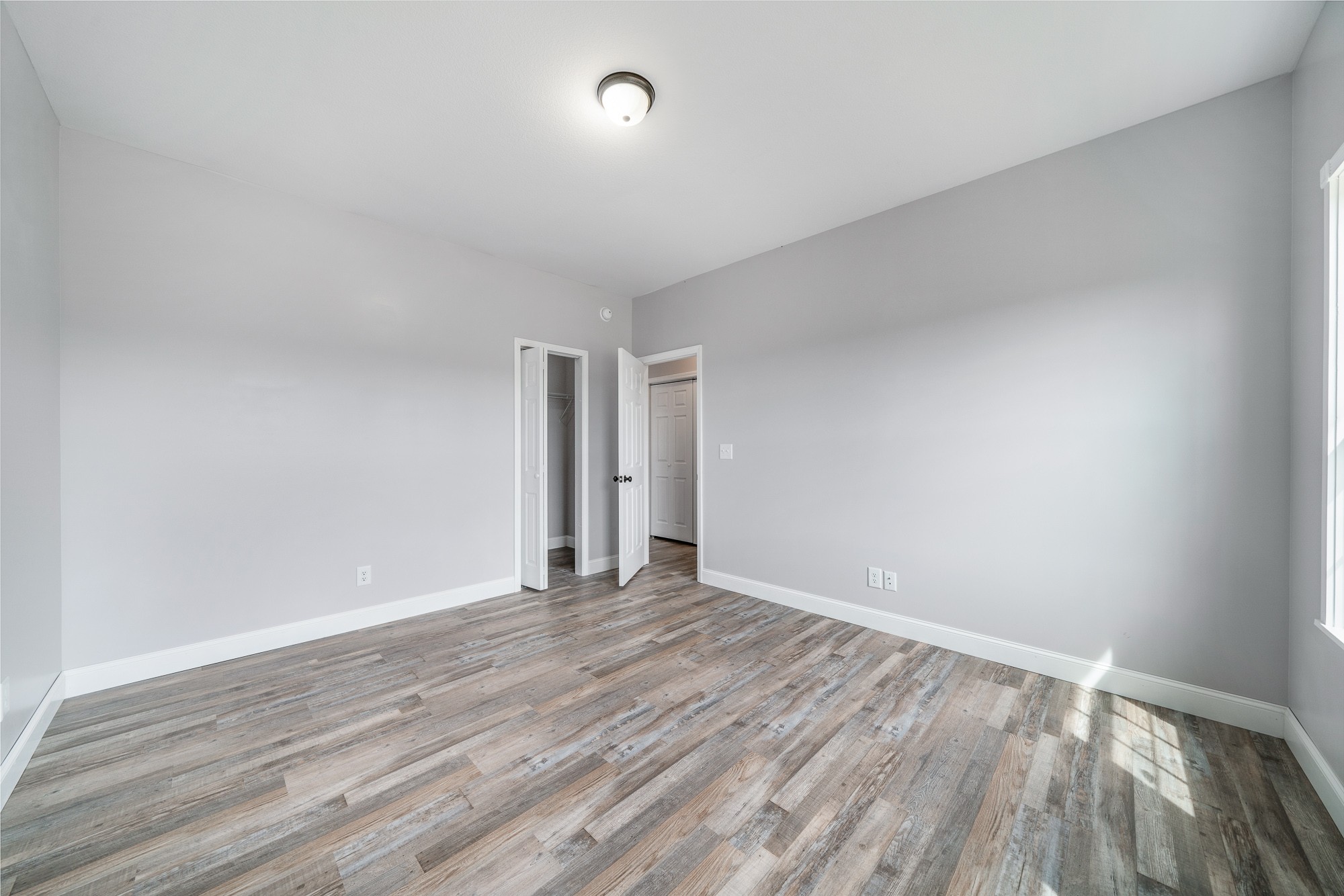 133 Cardinal Way Lancing, TN 37770 - Photo 19 of 35 a view of an empty room with wooden floor