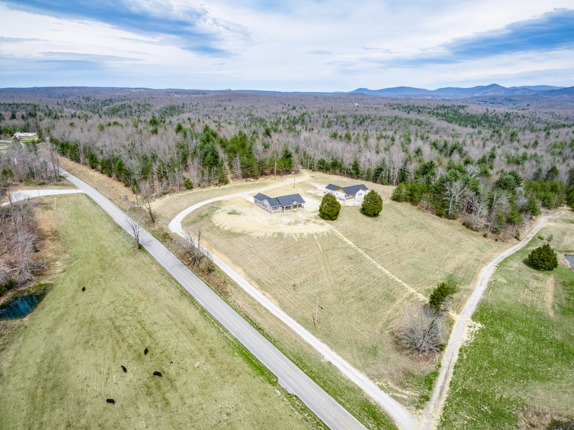 133 Cardinal Way Lancing, TN 37770 - Photo 32 of 35 a view of a lake with a mountain