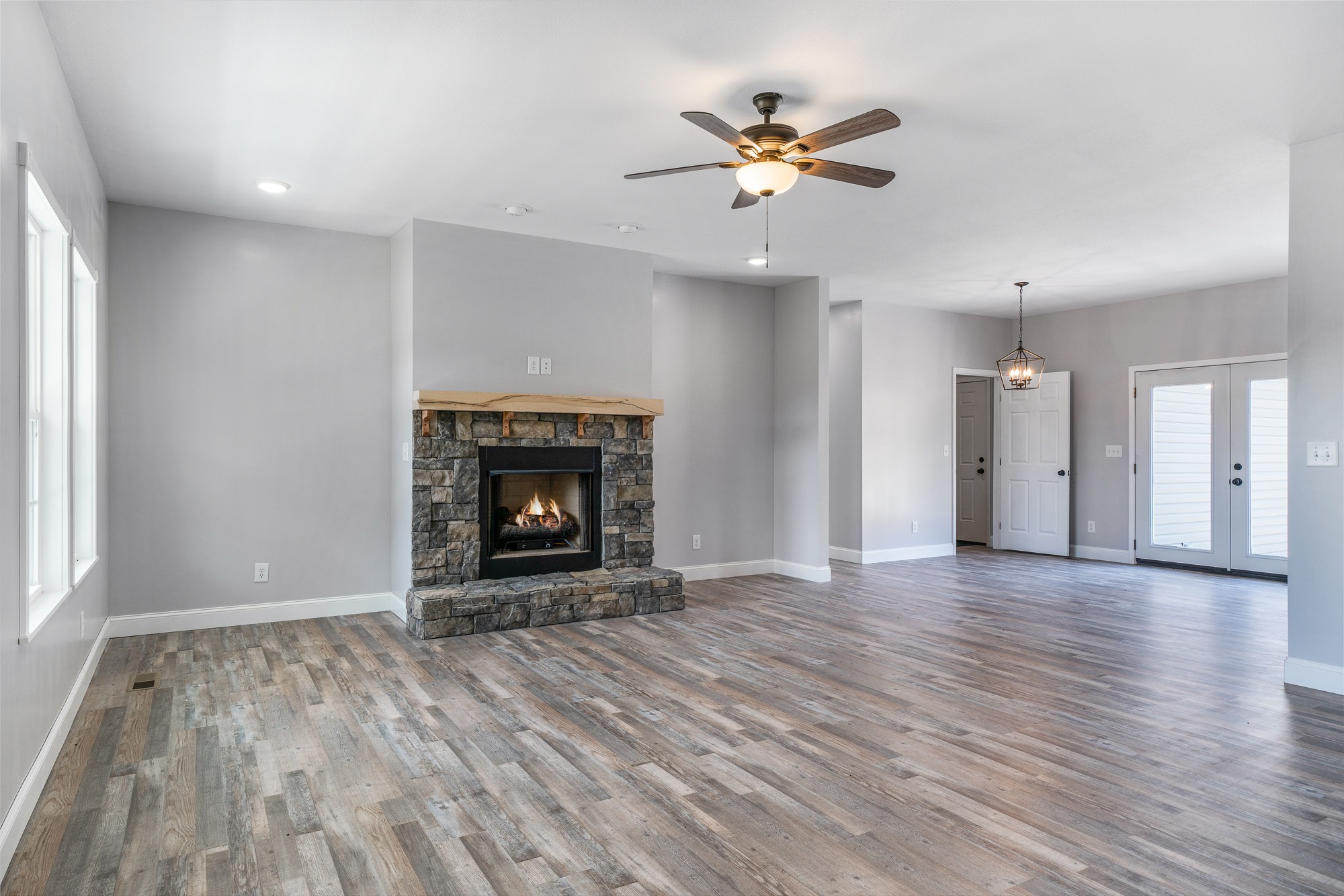 133 Cardinal Way Lancing, TN 37770 - Photo 8 of 35 a view of an empty room with a fireplace and window