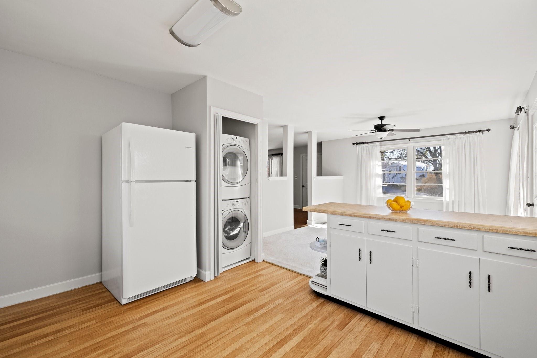 480 Loop Road Hendersonville, NC 28792 - Photo 11 of 26 a view of a kitchen with wooden floor and electronic appliances