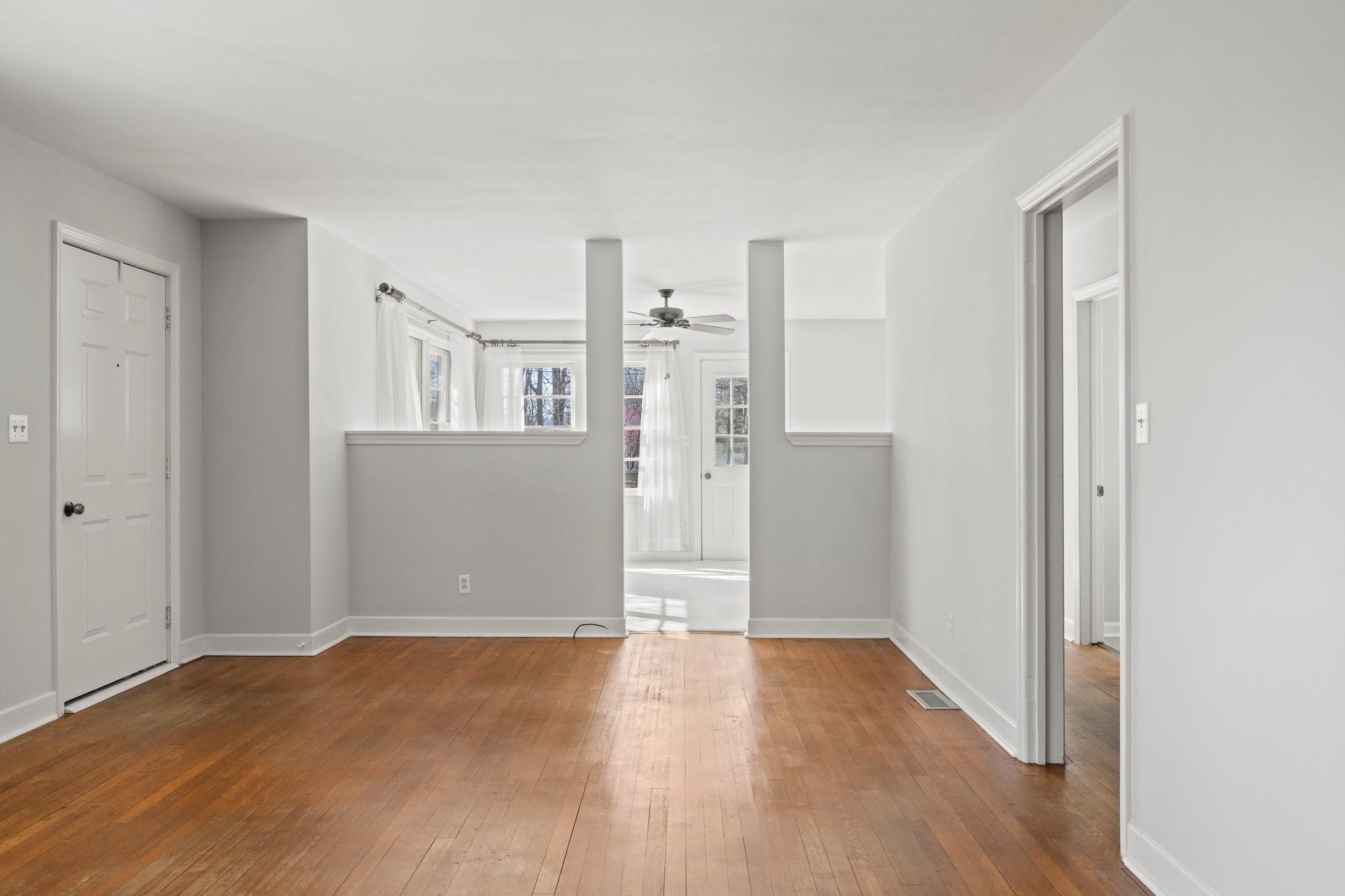 480 Loop Road Hendersonville, NC 28792 - Photo 6 of 26 a view of empty room with wooden floor