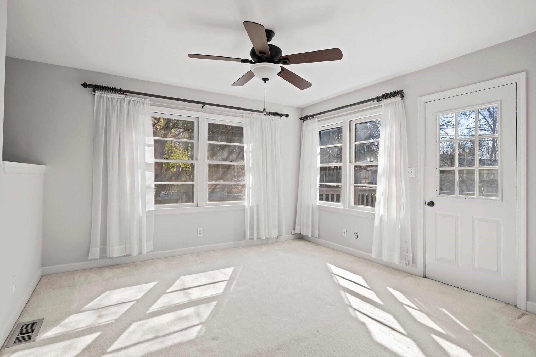 480 Loop Road Hendersonville, NC 28792 - Photo 7 of 26 a view of an empty room with a window