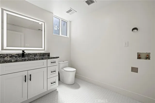 a view of a bedroom with a window