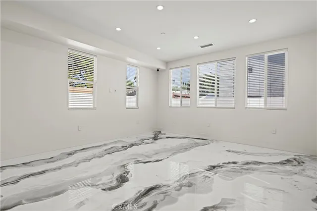 a view of a back yard from a balcony