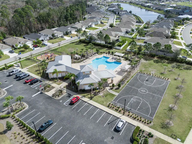 a view of swimming pool with a yard