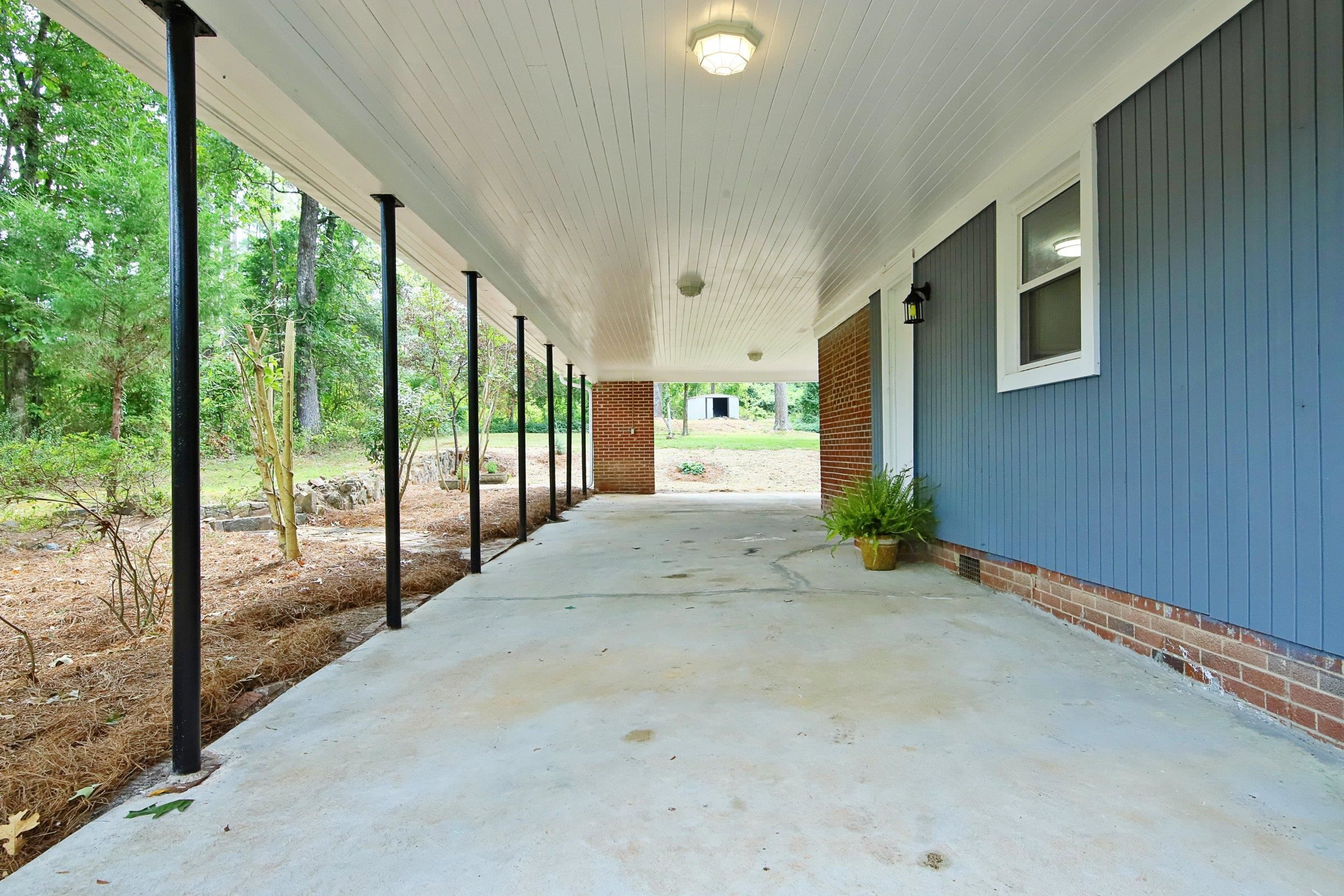 5902 Barbee Chapel Road Chapel Hill, NC 27517 - Photo 25 of 29 Large Covered Patio on Side of house