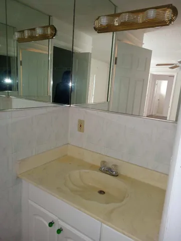 a bathroom with a tub and shower