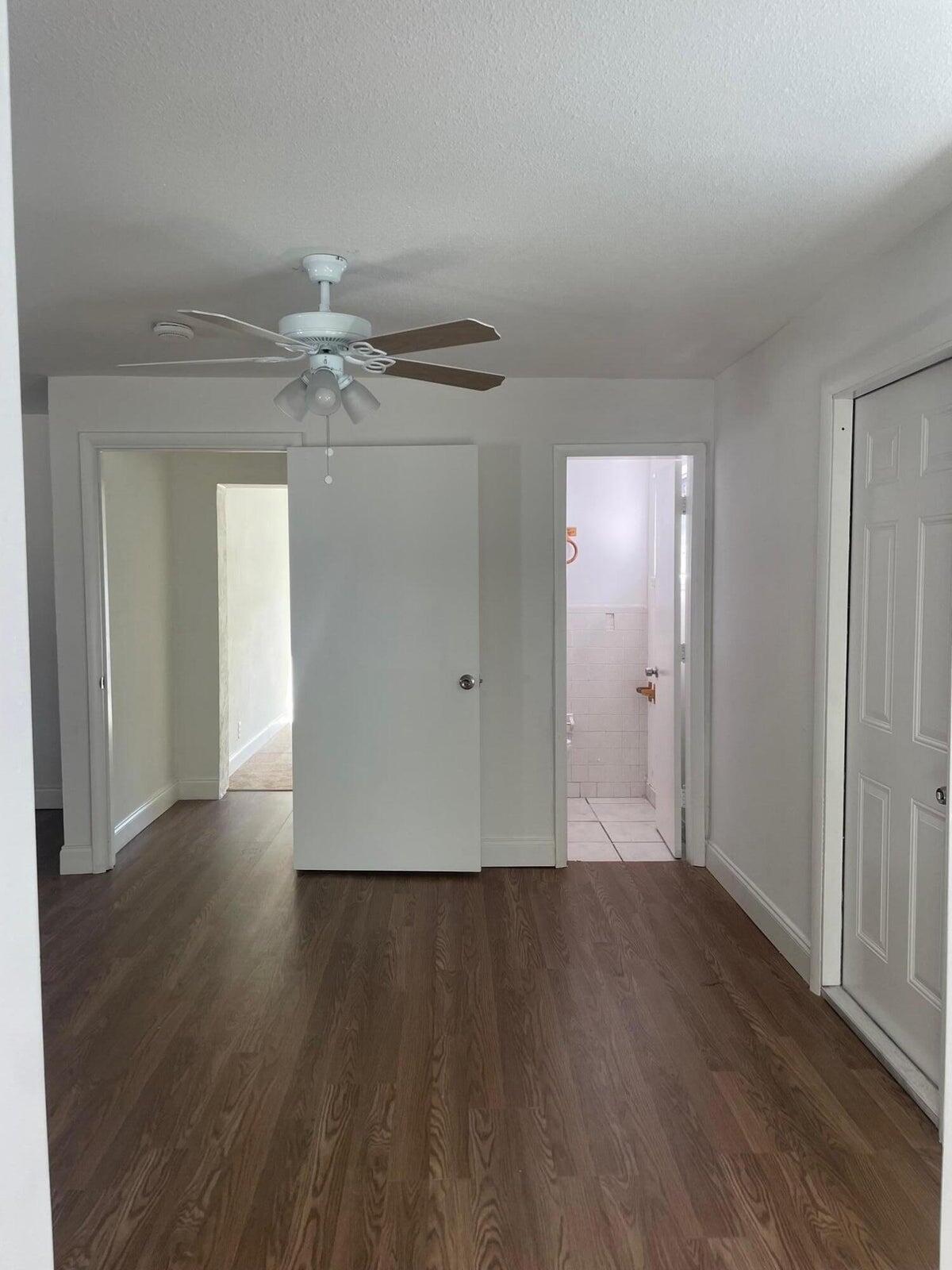 305 Northwest 4th Avenue Delray Beach, FL 33444 - Photo 39 of 45 a view of an empty room with wooden floor