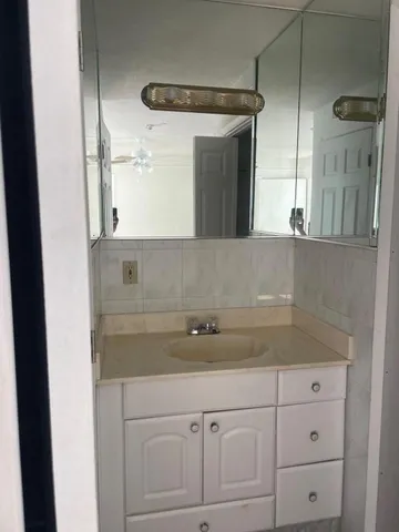 a view of kitchen and wooden floor