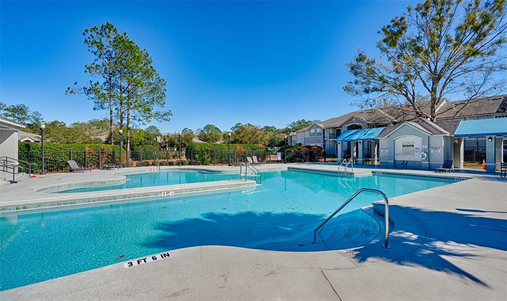 3705 Southwest 27th Street, Unit 926 Gainesville, FL 32608 - Photo 28 of 39 a view of house with outdoor space and swimming pool