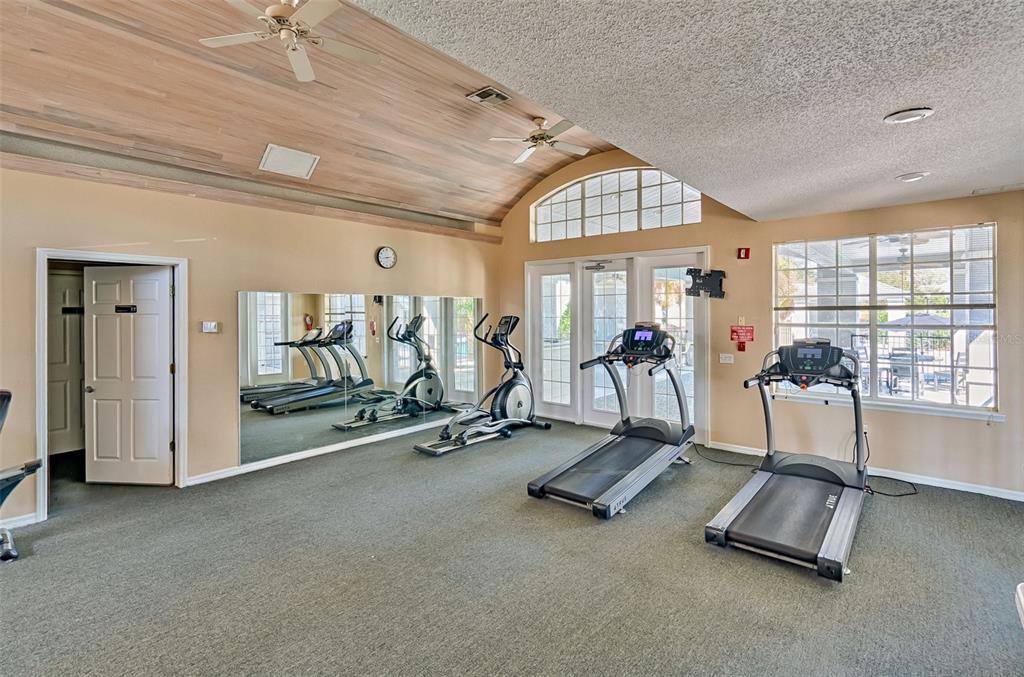 3705 Southwest 27th Street, Unit 926 Gainesville, FL 32608 - Photo 29 of 39 a view of a room with gym equipment