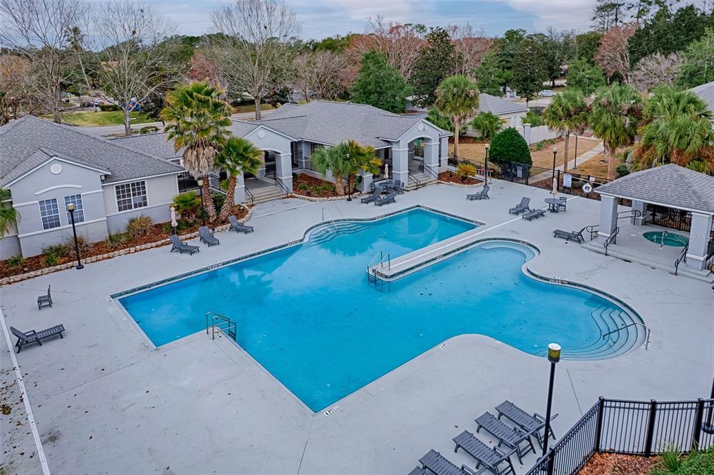 3705 Southwest 27th Street, Unit 926 Gainesville, FL 32608 - Photo 37 of 39 an aerial view of a house with swimming pool and patio