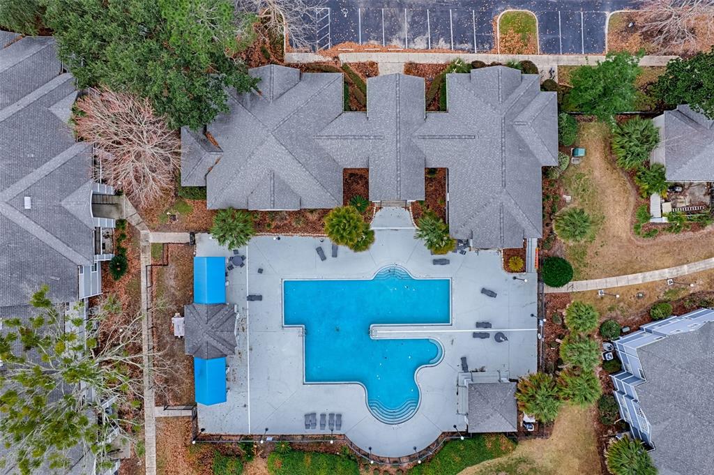 3705 Southwest 27th Street, Unit 926 Gainesville, FL 32608 - Photo 38 of 39 an aerial view of multiple houses with outdoor space
