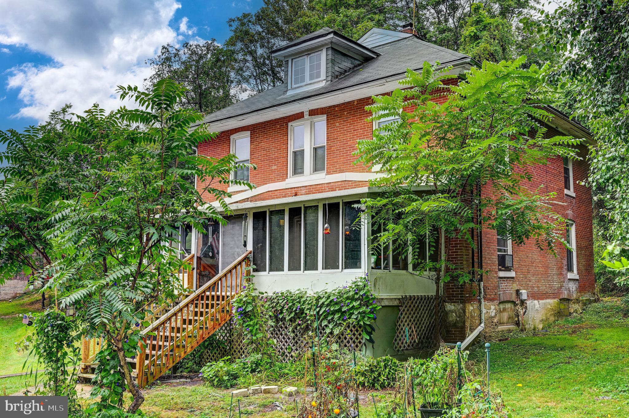 334 North Tannery Road Westminster, MD 21157 - Photo 3 of 20 a front view of a house with garden