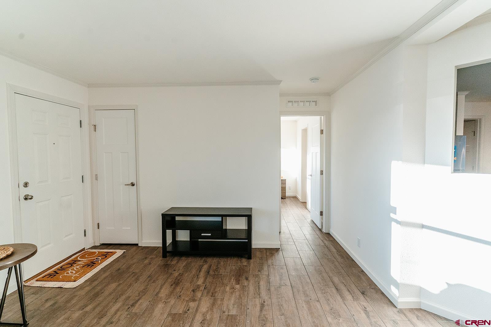 62650 Lasalle Road, Unit 325 Montrose, CO 81403 - Photo 14 of 24 a view of a room with wooden floor and electronic appliances