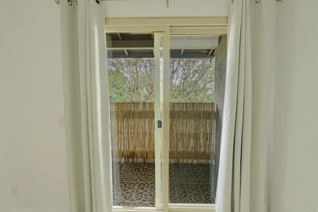 a view of a glass door with a glass door
