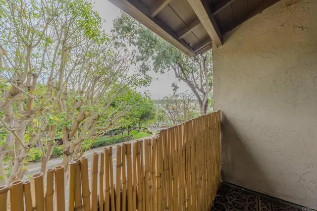 a view of a wooden fence