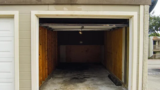 a view of backyard with wooden floor and fence