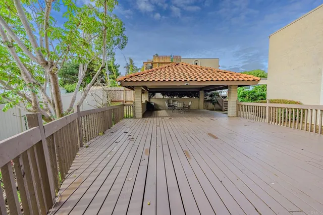 a terrace with wooden floor
