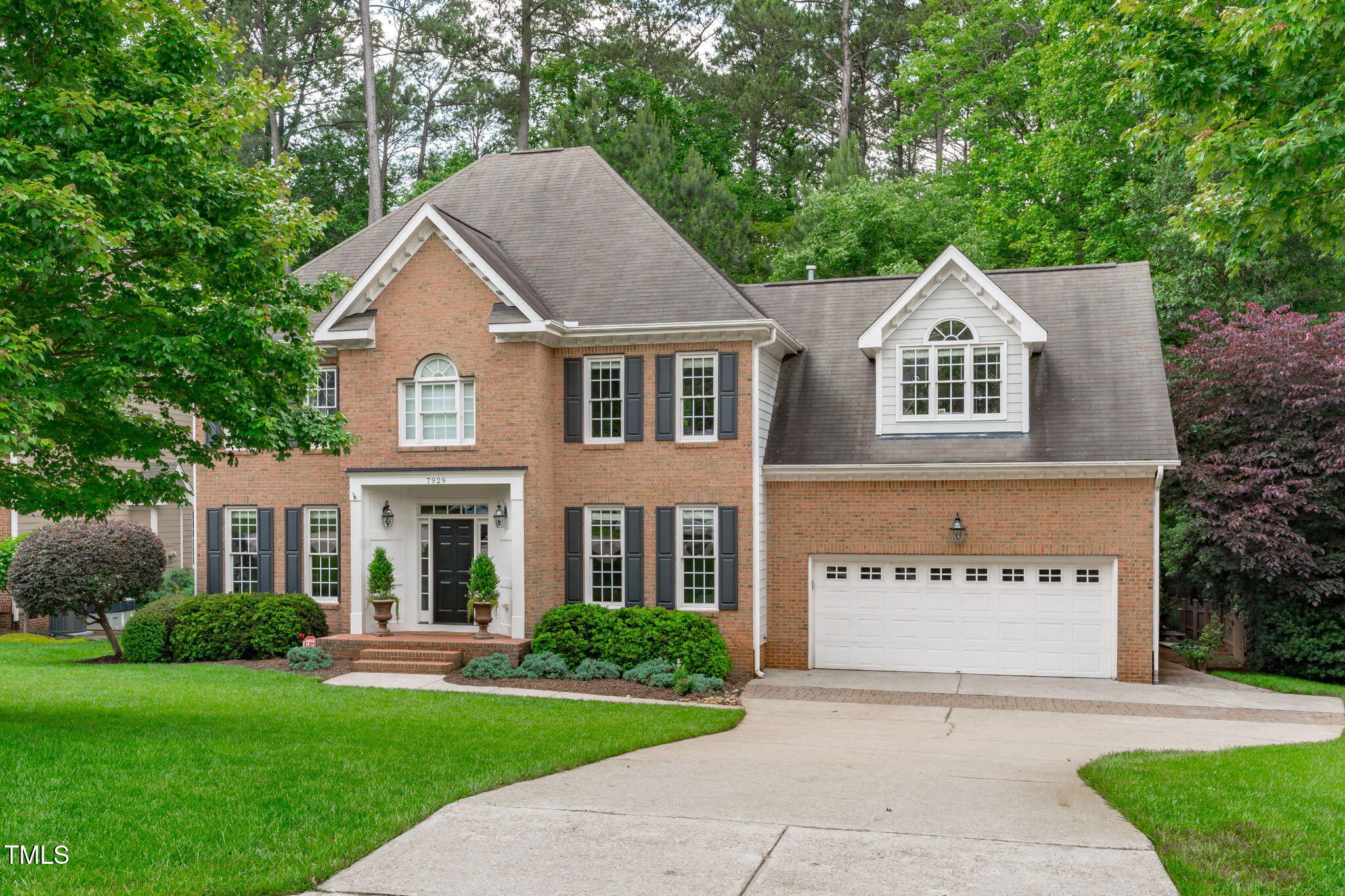 7929 Pine Timber Drive Raleigh, NC 27613 - Photo 1 of 53 front view of house with a yard