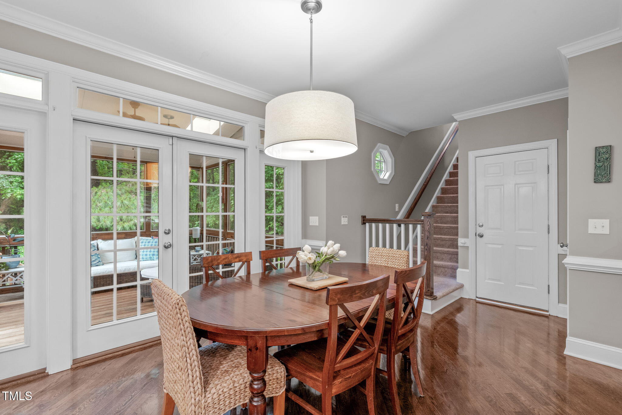 7929 Pine Timber Drive Raleigh, NC 27613 - Photo 19 of 53 a view of a dining room with furniture window and wooden floor