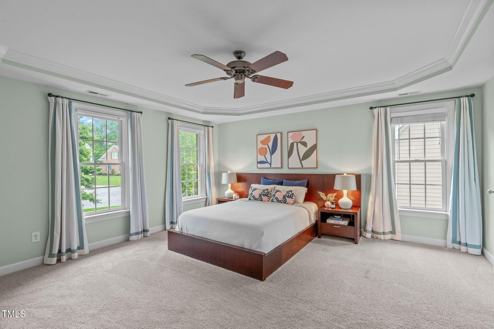 7929 Pine Timber Drive Raleigh, NC 27613 - Photo 27 of 53 a bedroom with a bed and a large window