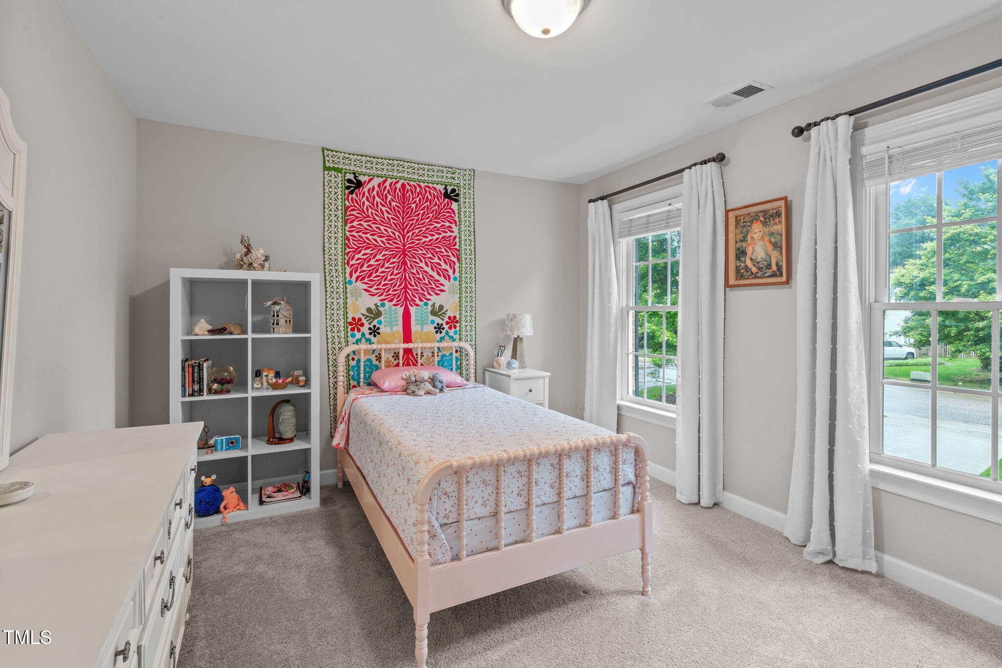 7929 Pine Timber Drive Raleigh, NC 27613 - Photo 31 of 53 a bedroom with a bed and a window