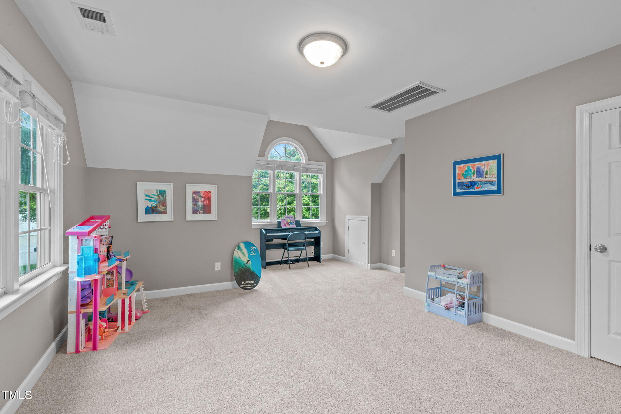 7929 Pine Timber Drive Raleigh, NC 27613 - Photo 37 of 53 an empty room with furniture and a window