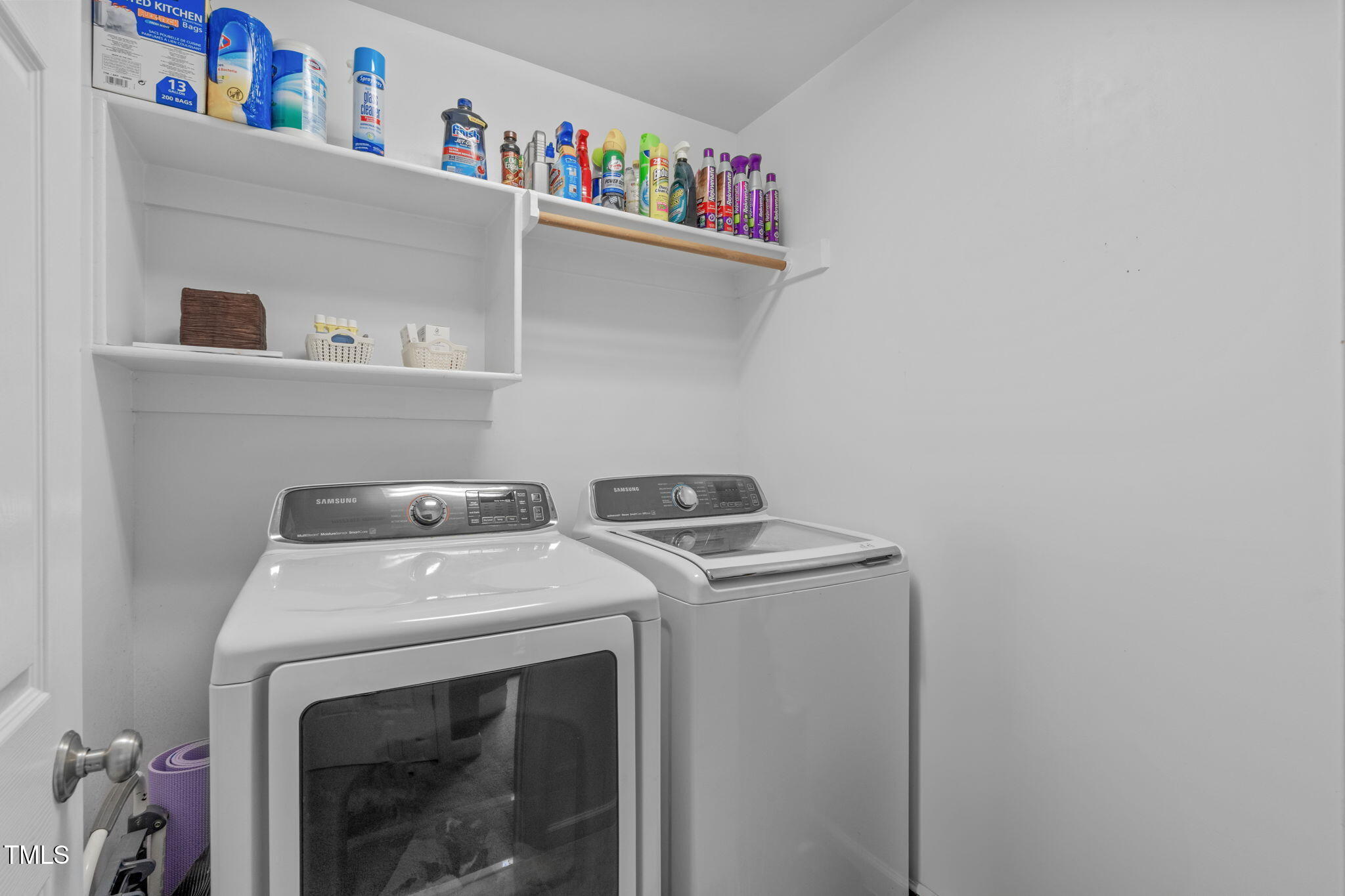 7929 Pine Timber Drive Raleigh, NC 27613 - Photo 39 of 53 a utility room with dryer and washer