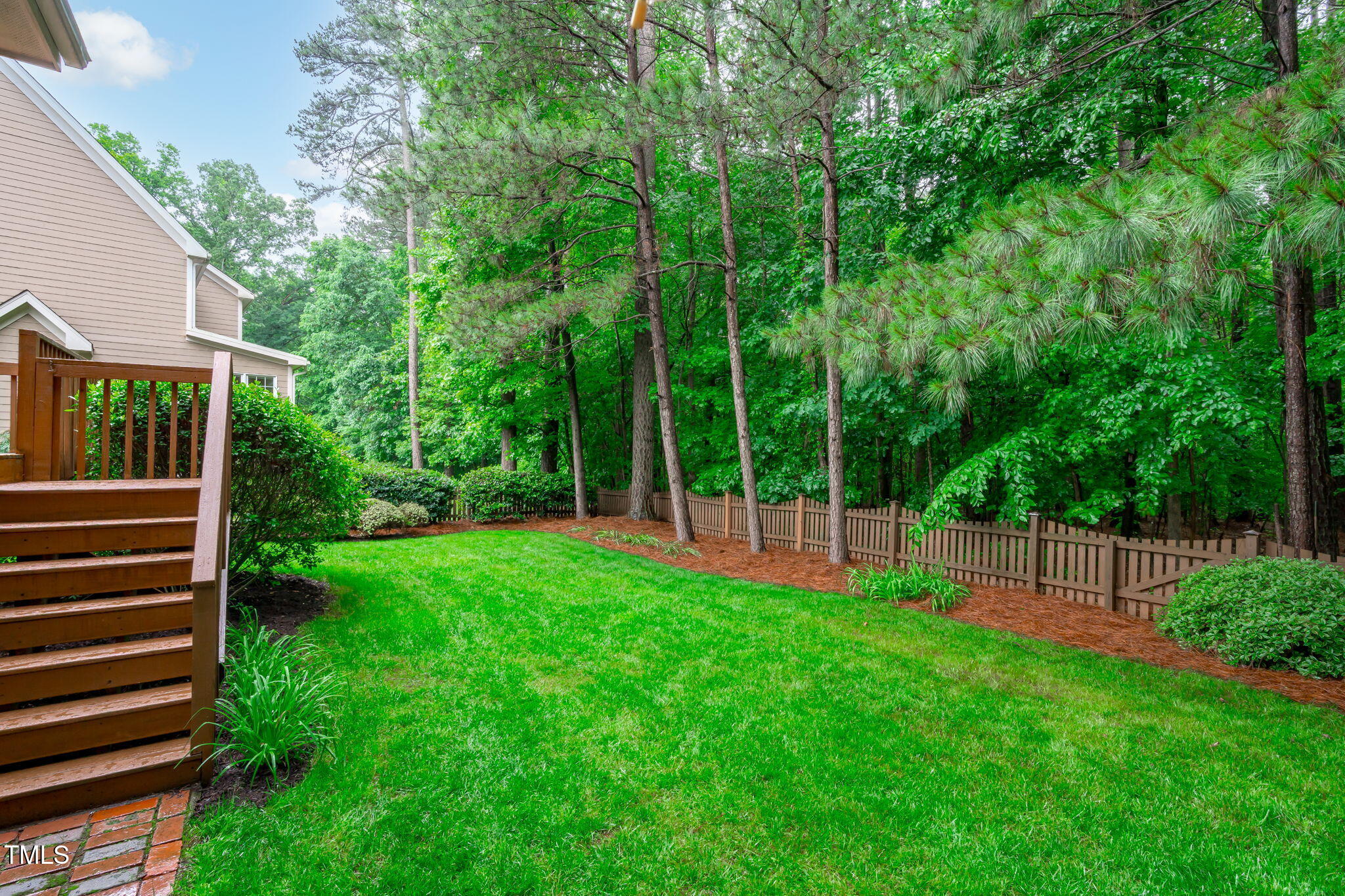 7929 Pine Timber Drive Raleigh, NC 27613 - Photo 43 of 53 a view of a backyard with a swing