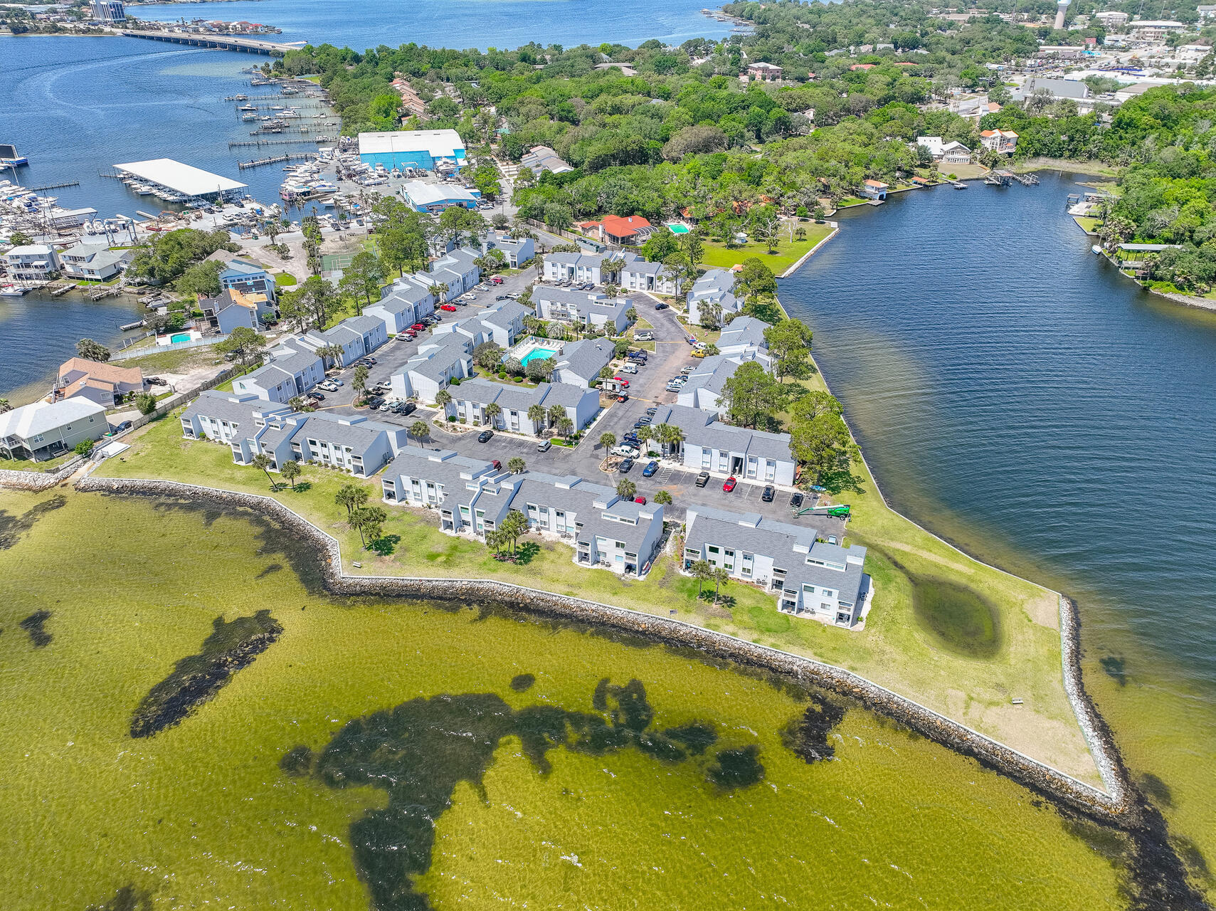 a view of a swimming pool with a yard